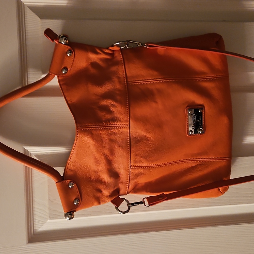 ValentinA leather handbag w/shoulder strap.